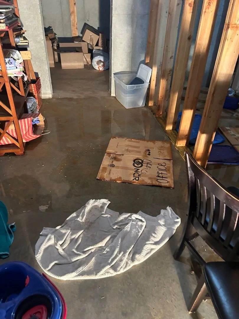 Water on floor of basement after water heater leak