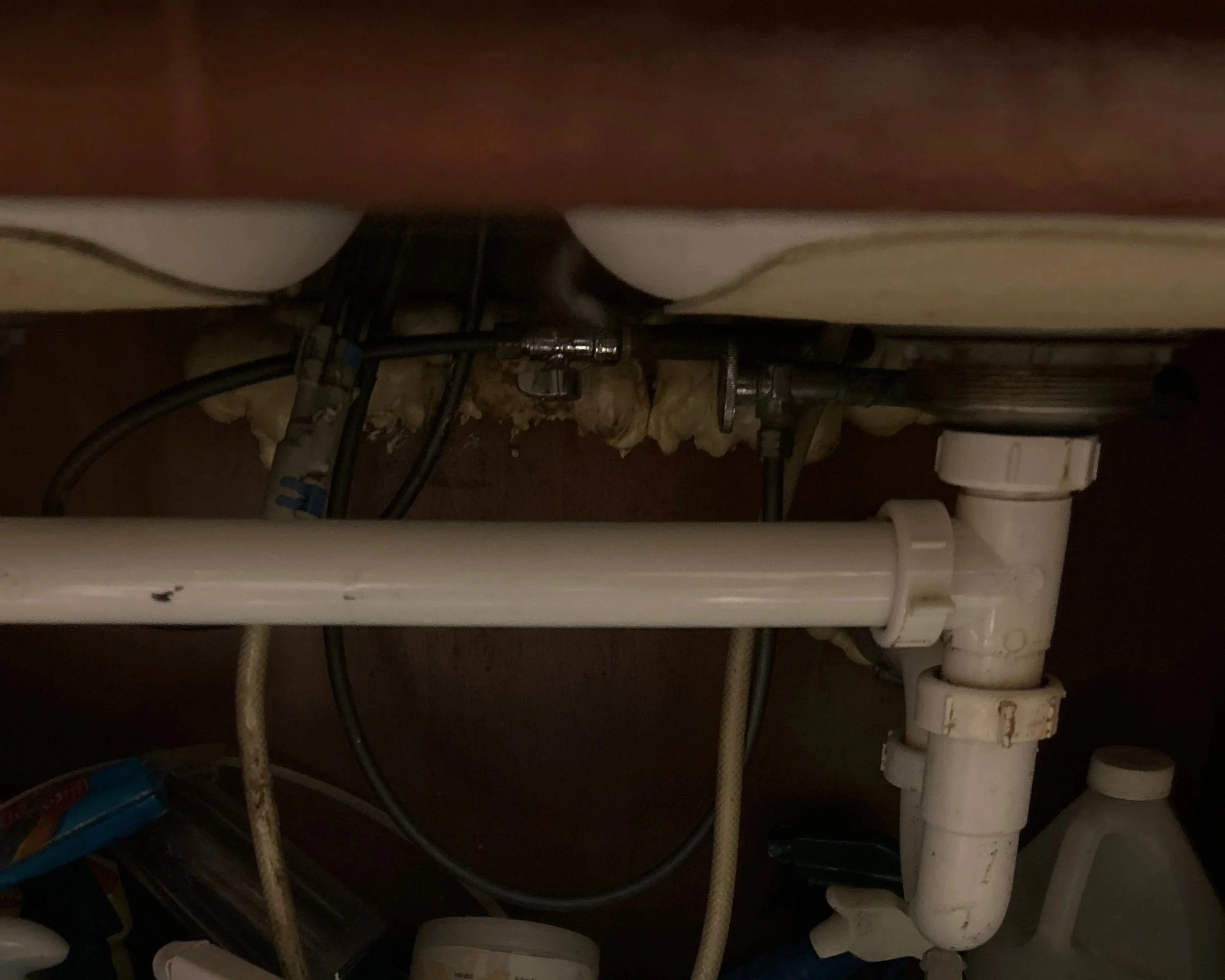 The repaired pipe after it burst causing water damage to the customer's home