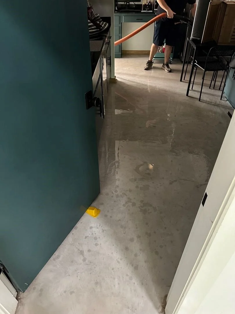 ServiceMaster extracting water from the Break Room