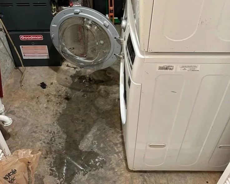 Front loading washer door opened during wash cycle causing water damage to the basement