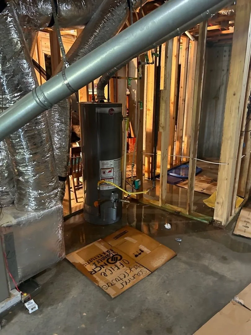 Water on floor of basement after water heater leak