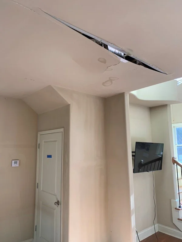 Ceiling and walls damaged after a pipe burst during a freeze