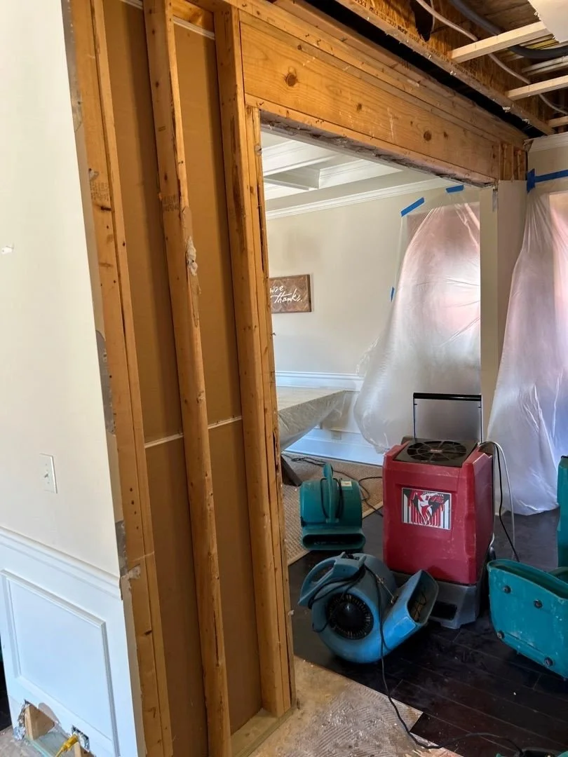 ServiceMaster removed damaged drywall from ceiling and wall in Hallway