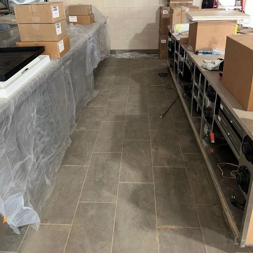 Behind the cashier counter before ServiceMaster cleaning