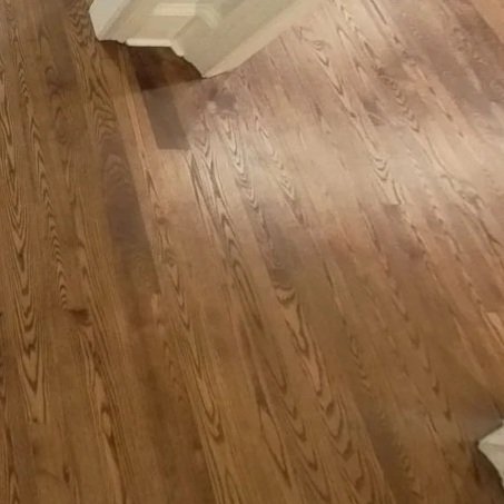 Hardwood flooring laid back down after ServiceMaster drying to save the floors