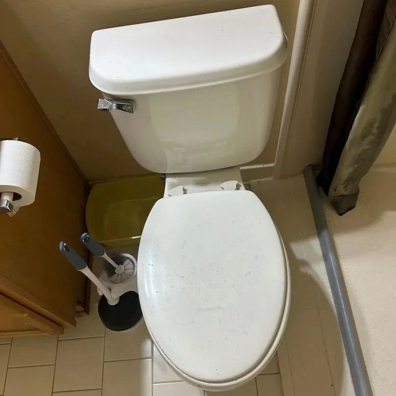 A "wobbly" toilet that leaked causing water damage in the home