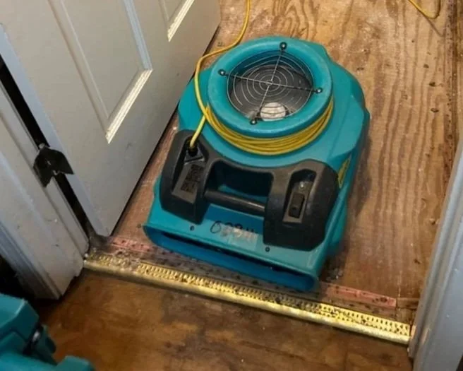 ServiceMaster drying equipment set to save the plywood subfloor