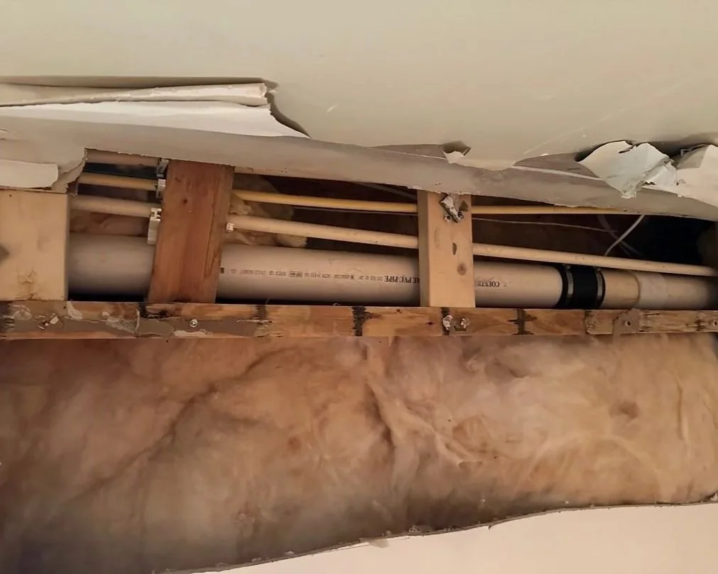 Repaired pipe after it burst causing water damage to the finished basement