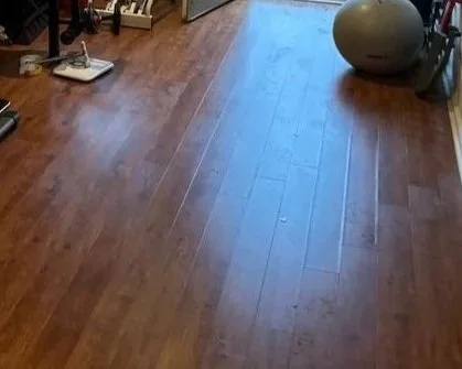 Gym laminate floor after water heater burst