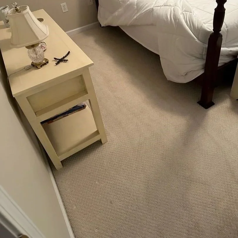 Guest bedroom carpet before regular ServiceMaster carpet cleaning service