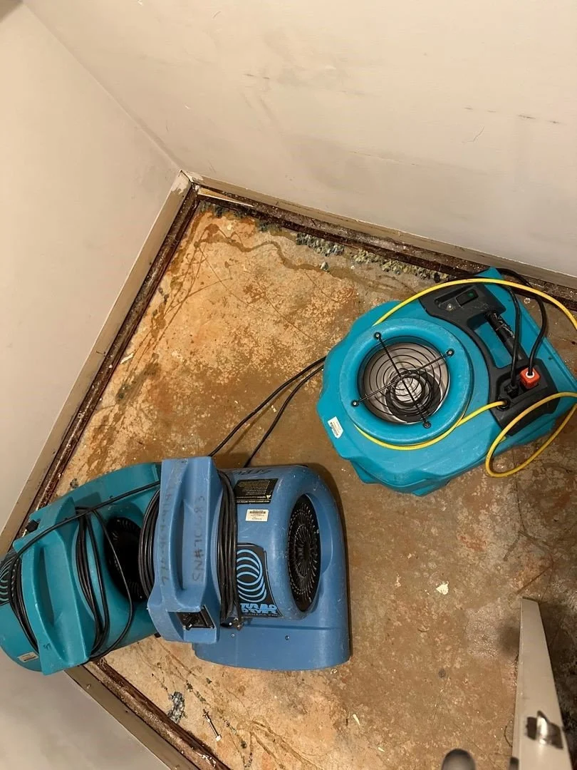 ServiceMaster equipment drying the closet subfloor
