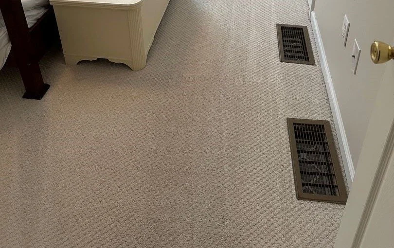 Bedside entryway carpet after ServiceMaster carpet cleaning