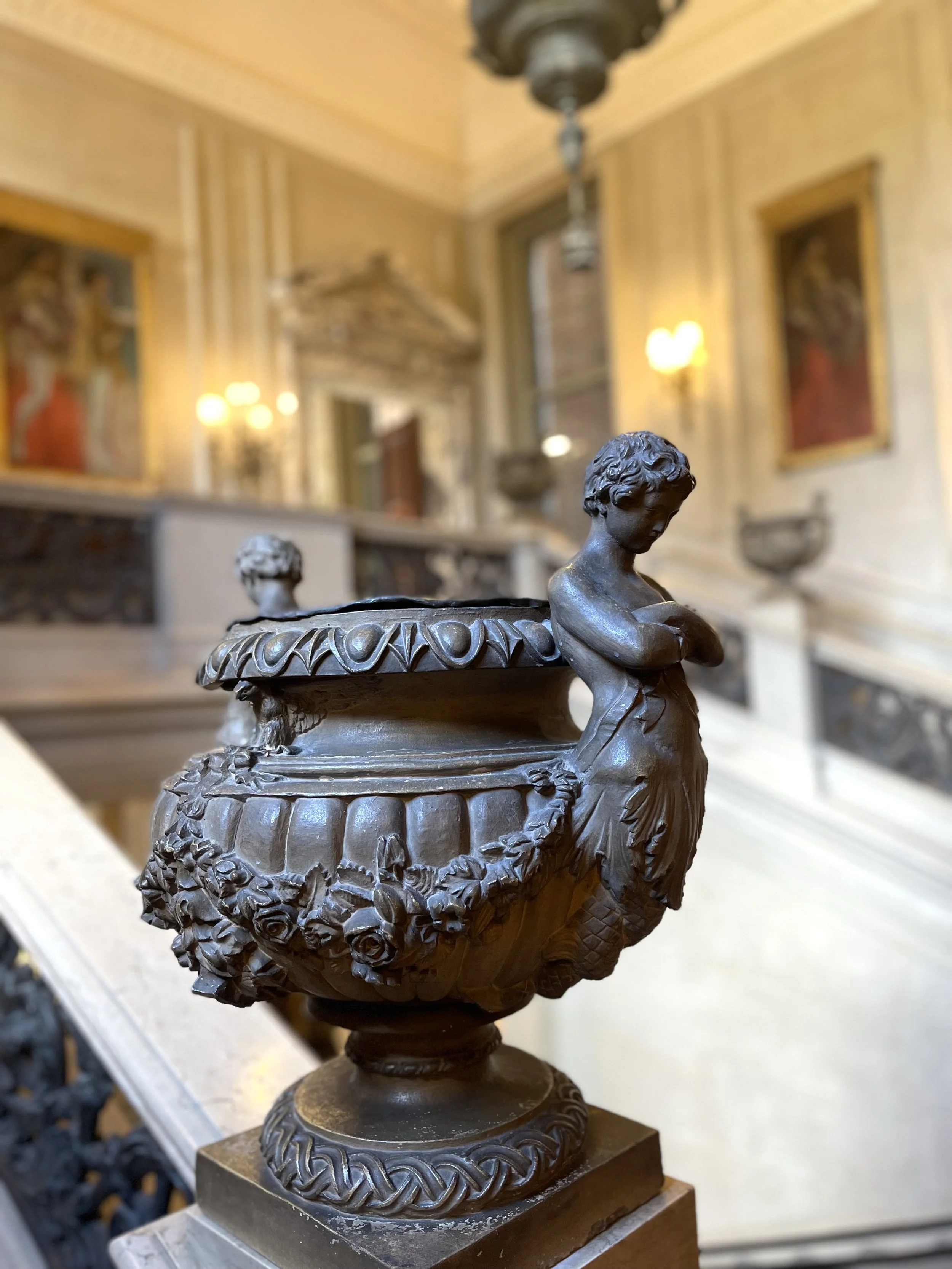 Six urns up the Great Staircase
