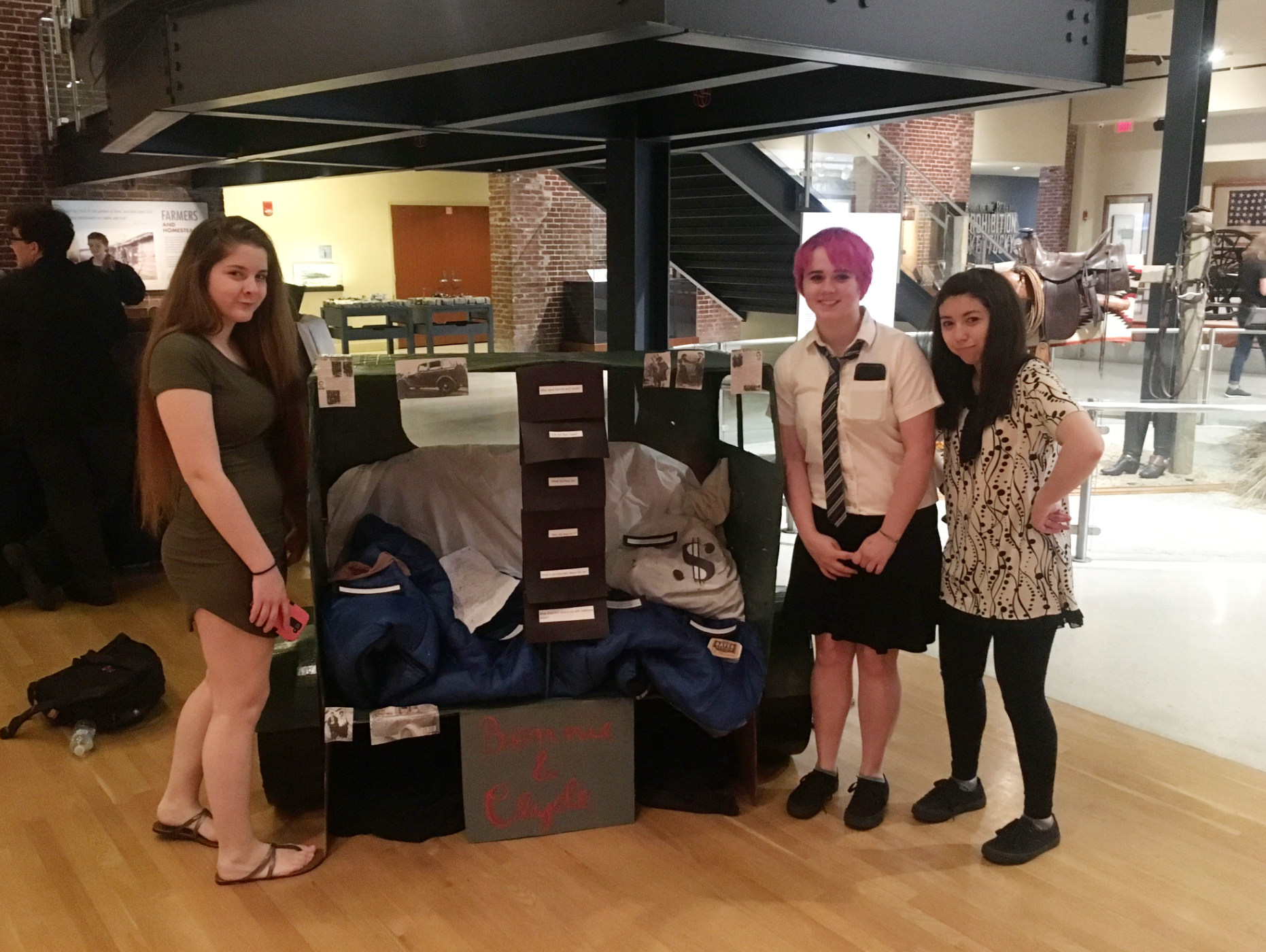 Students presenting their displays at the Frazier History Museum.