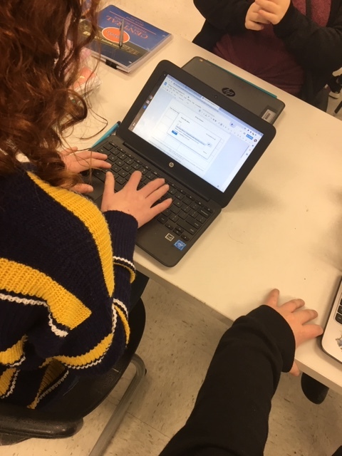 Students sharing their group contract via Google Drive.
