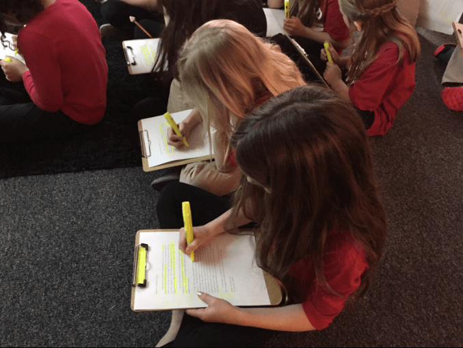 Kids working through Entry Document (1).png