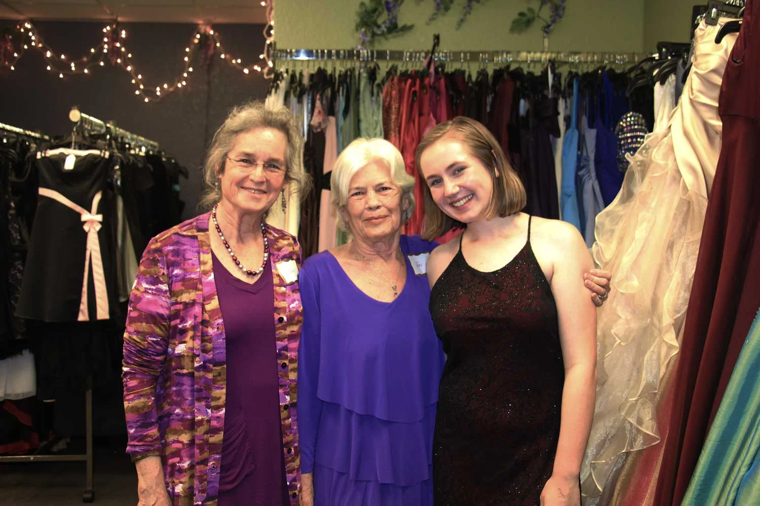 Teri Nelson, pictured center, founder.