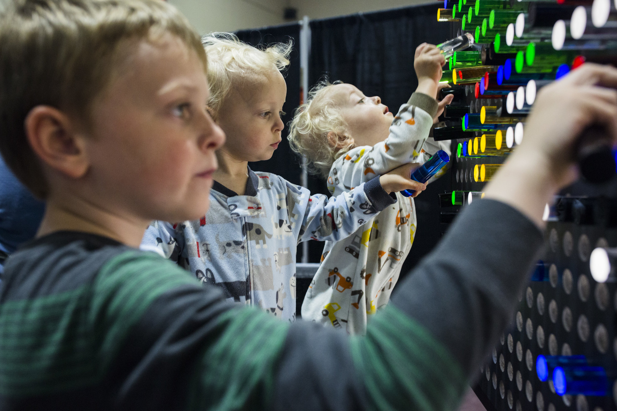  Jacob, 6, Garrett, 2, and Cameron Boland, 2, play at the Giant Light Bright at Rochester Institute of Technology during Imagine RIT on May 6, 2017. The Imagine RIT: Innovation and Creativity Festival is an annual event that showcases the achievement