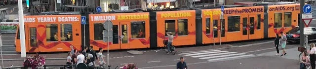 Amsterdam trams said - "AIDS Yearly Deaths: 1 million - Amsterdam population: 900,000. Keepthe PromiseOnAIDS.org ” The Dutch people are very welcoming...!!!