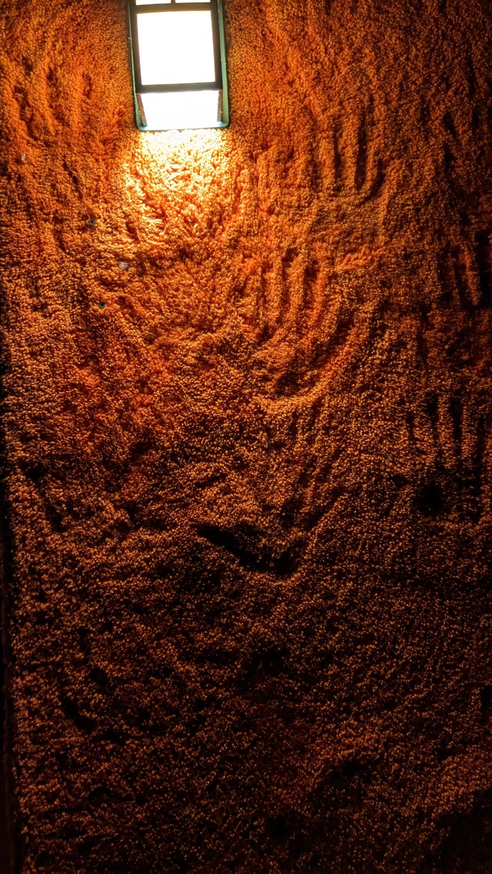 scary_hands_rug_wall_house_on_the_rock.jpg