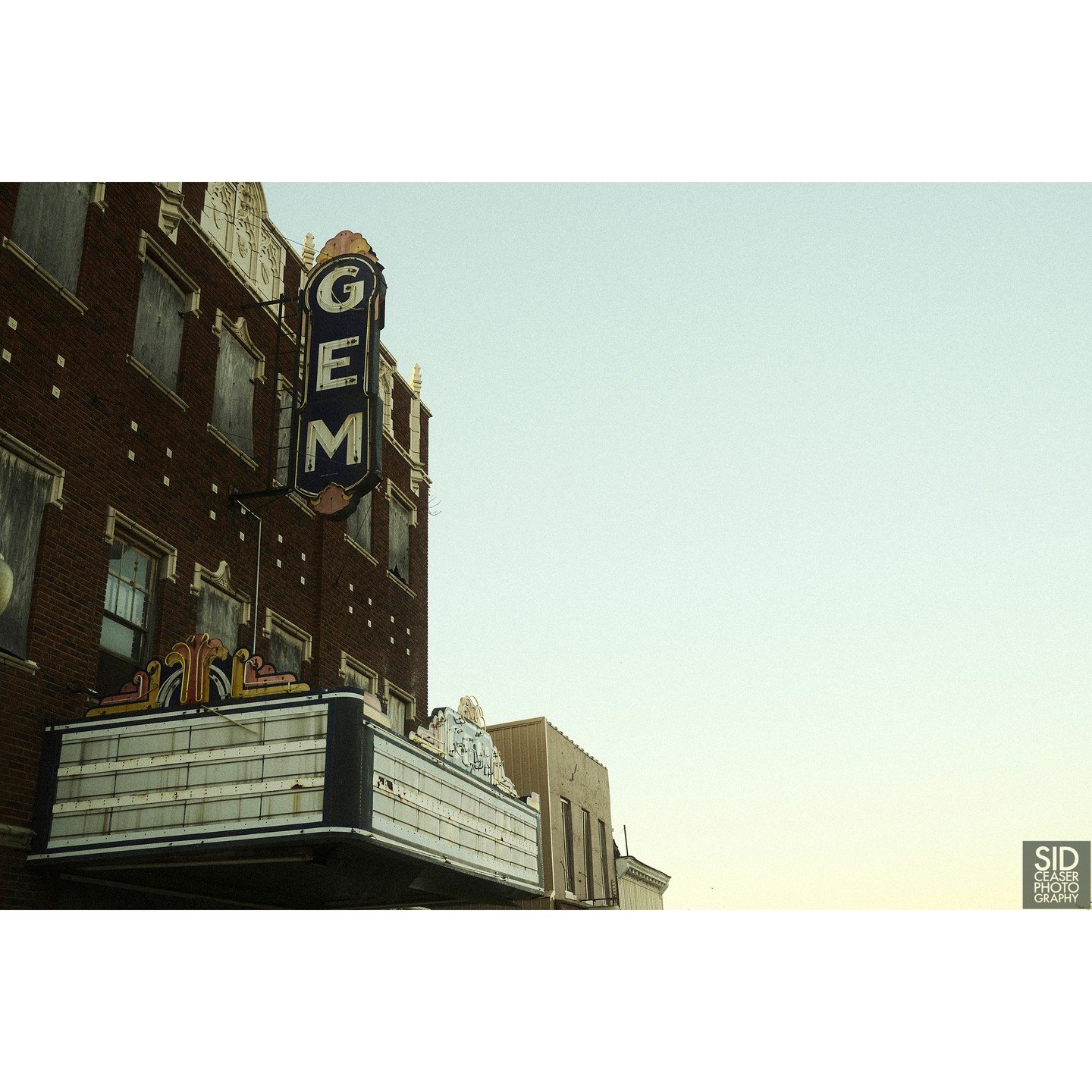 The abandoned Gem Theater in Cairo, Illinois.

I love this photograph.

Our trip took us unexpectedly into Cario, Illinois, which is the southernmost city in Illinois. The sun was going down and suddenly we drove into an almost completely abandoned t