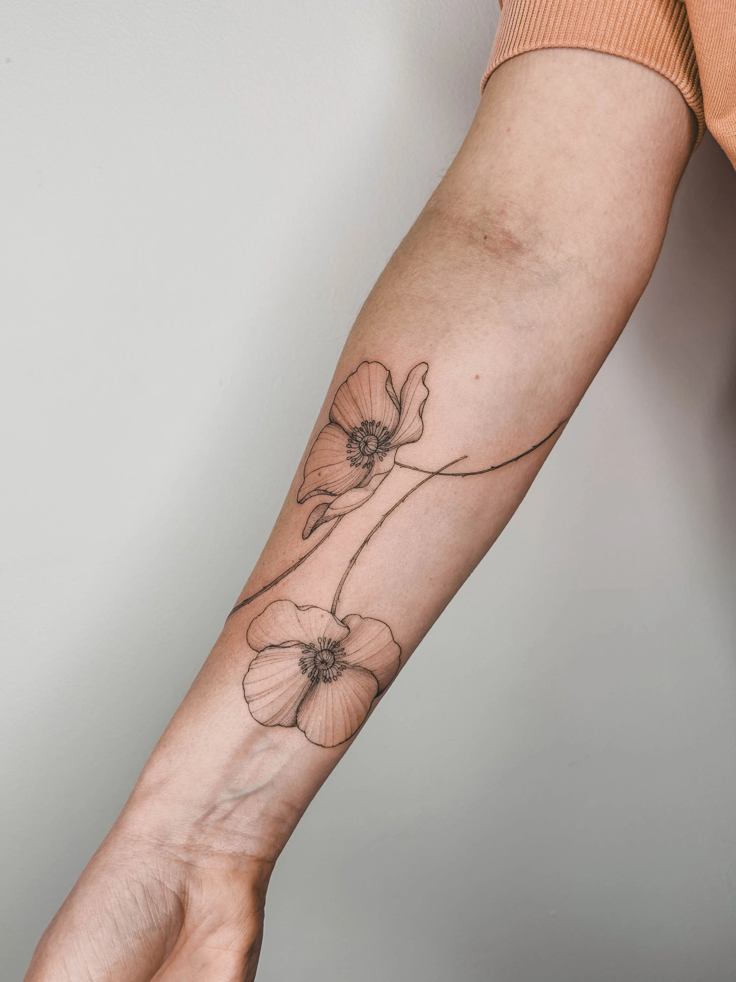 fine line floral tattoo Paris.jpg