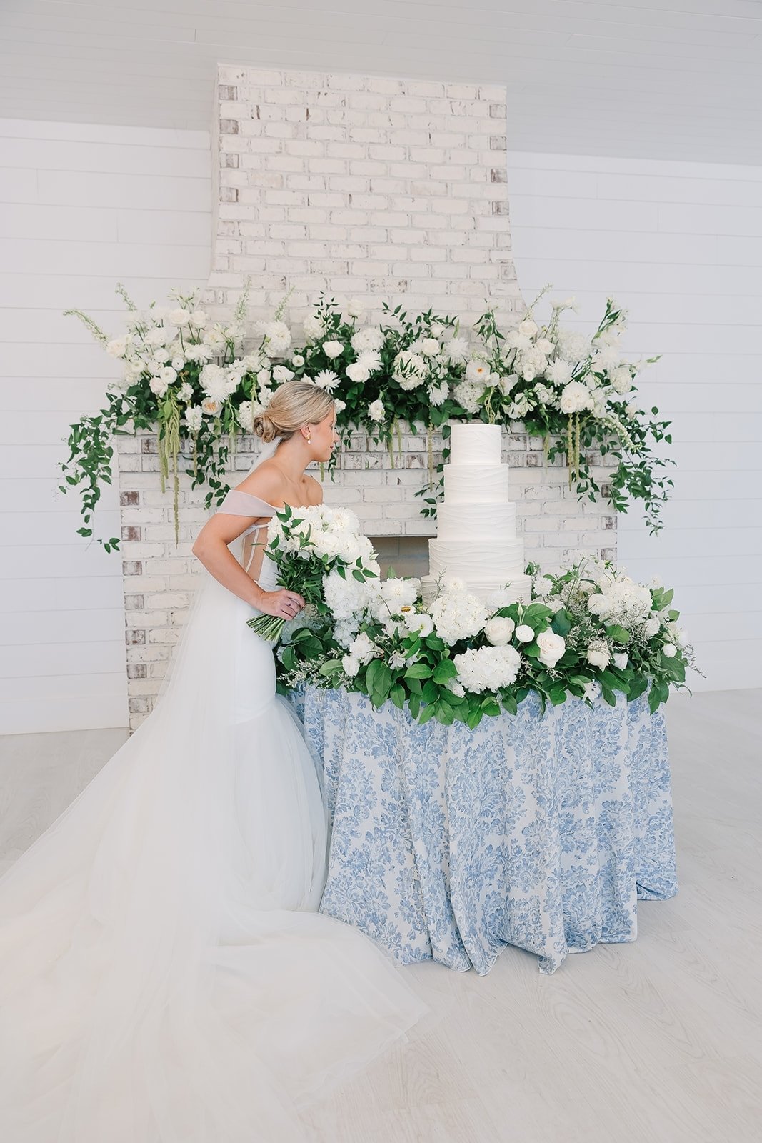 Find a better cake photo, we'll wait. 
@blushbakingco, @nicolecolwelldesignandco, and @itsheatherchipps collaborated with us to create a MOMENT. Here's to all the 2024 moments-we can't wait!

Now booking 2025 weddings!

#ivyrosebarn #weddingfireplace