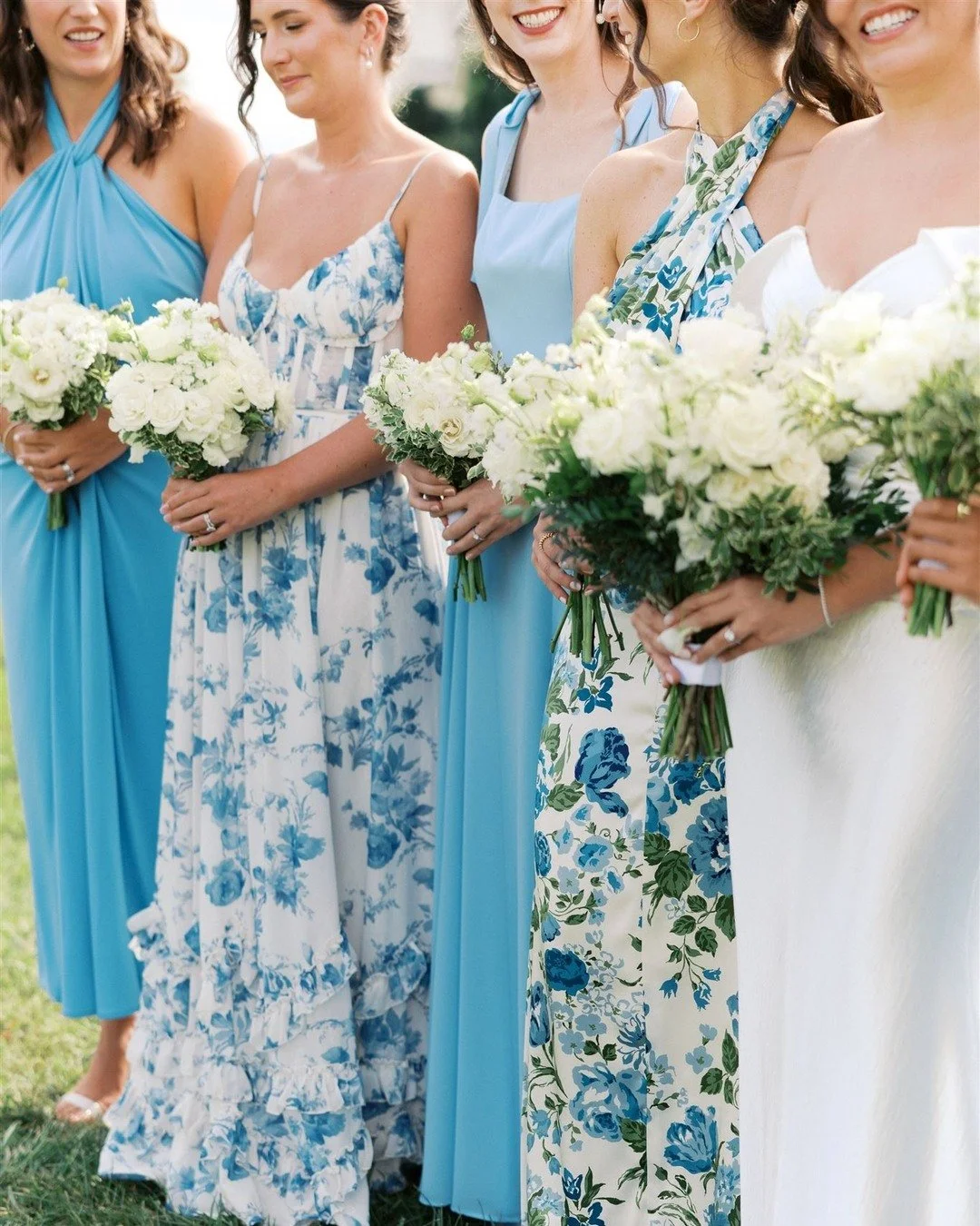 Colorful gowns that show off the personality of your crew always win. Keeping the florals soft and monochrome completes the look without competing. Loving how her vision came together!

For 2026 inquiries, please visit www.floralsbykimberly.com/inqui