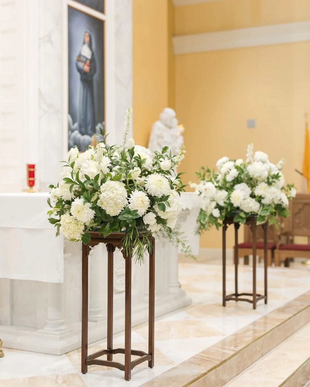 Big lovely arrangements for your church service will easily repurpose to wine barrels or tall stands for the reception!

Talk to your florist about maximizing those floral moments!

Ceremony Venue: St. Francis de Sales Catholic Church
Reception Venue