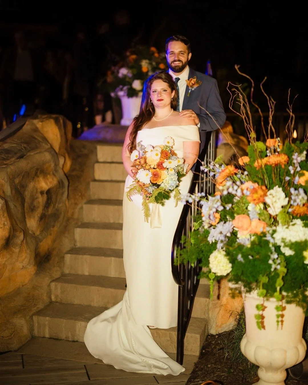 Cheers to this stunning couple! Wishing the two of you a lifetime of happiness! Happy Anniversary to E &amp; D! 

Virginia fall wedding | delphinium wedding flowers | orange and white florals | Virginia wedding florist
