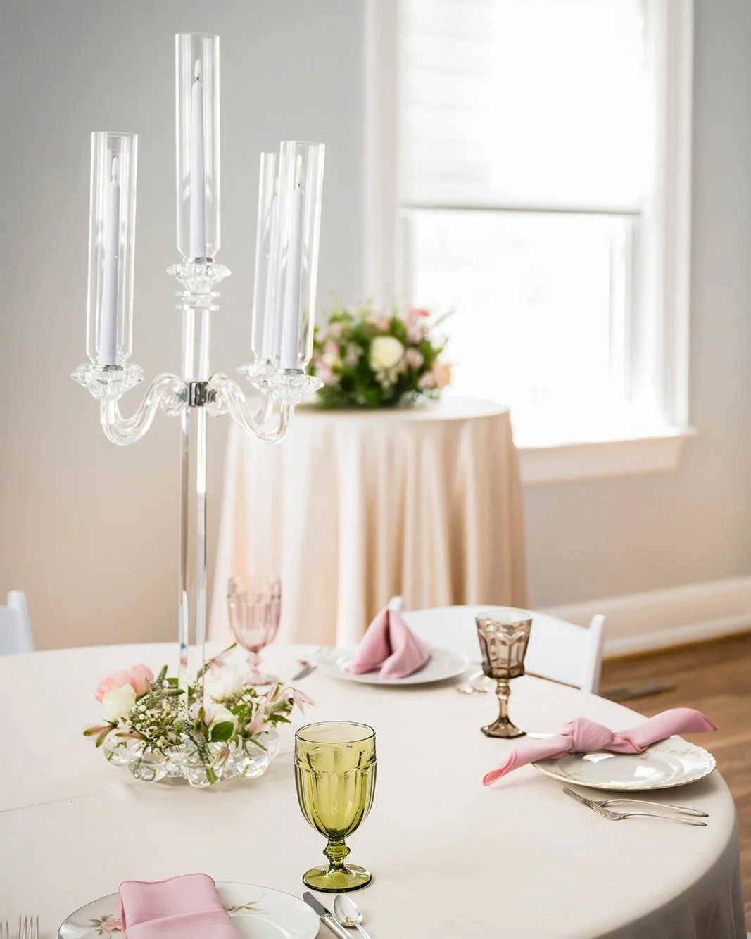 The candelabra is one of our favorite centerpieces right now &mdash; it brings such a timeless elegance to the table. Paired with bubble vases and playful florals below, it&rsquo;s the perfect way to add height without blocking conversation.

floral 