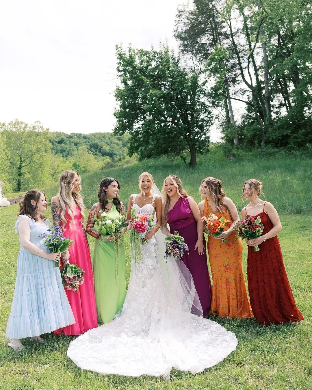 Alli told us she loved color, and we were more than happy to run with it! Each bridesmaid&rsquo;s bouquet was designed to complement her unique dress, and our beautiful bride's bouquet tied it all together with a little bit of everyone&rsquo;s blooms