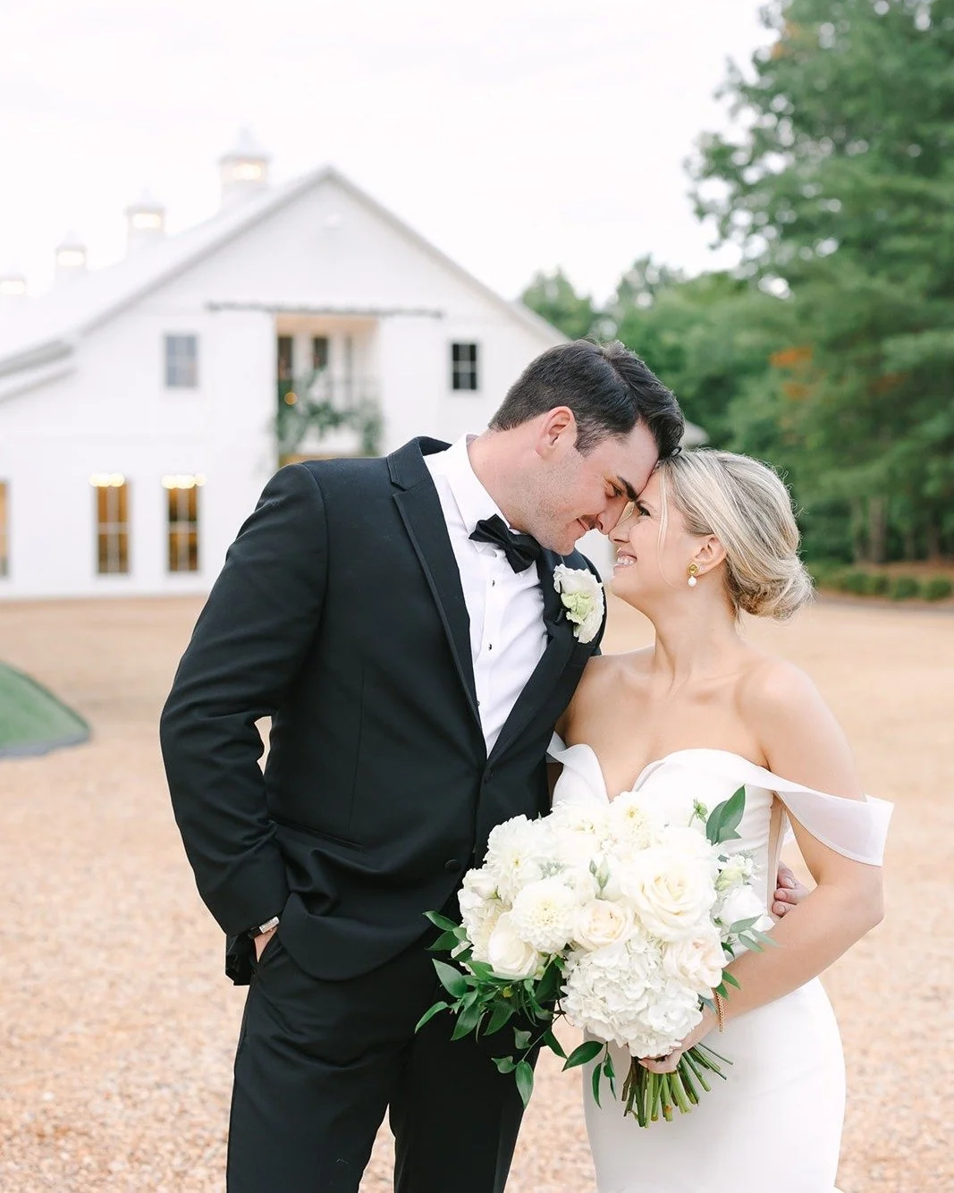 We&rsquo;ll never get over these dreamy chinoiserie touches (swipe through to see)! Blue and white vases were sprinkled throughout the venue, adding the perfect pop of pattern to Macy and Alex&rsquo;s timeless all-white florals. Chic, classic, and fu
