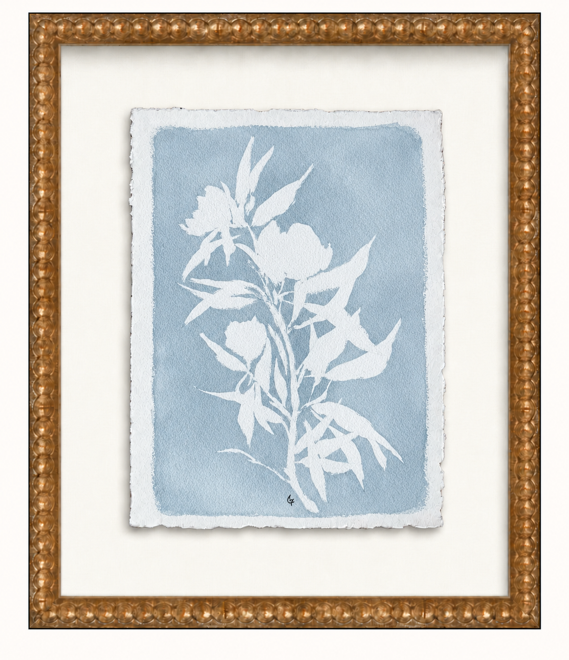 Blue-gray magnolia print in ornate frame.png