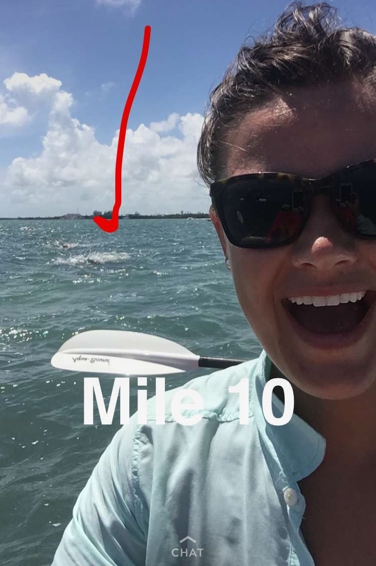   My sister Madi snap chatting my key west swim!  