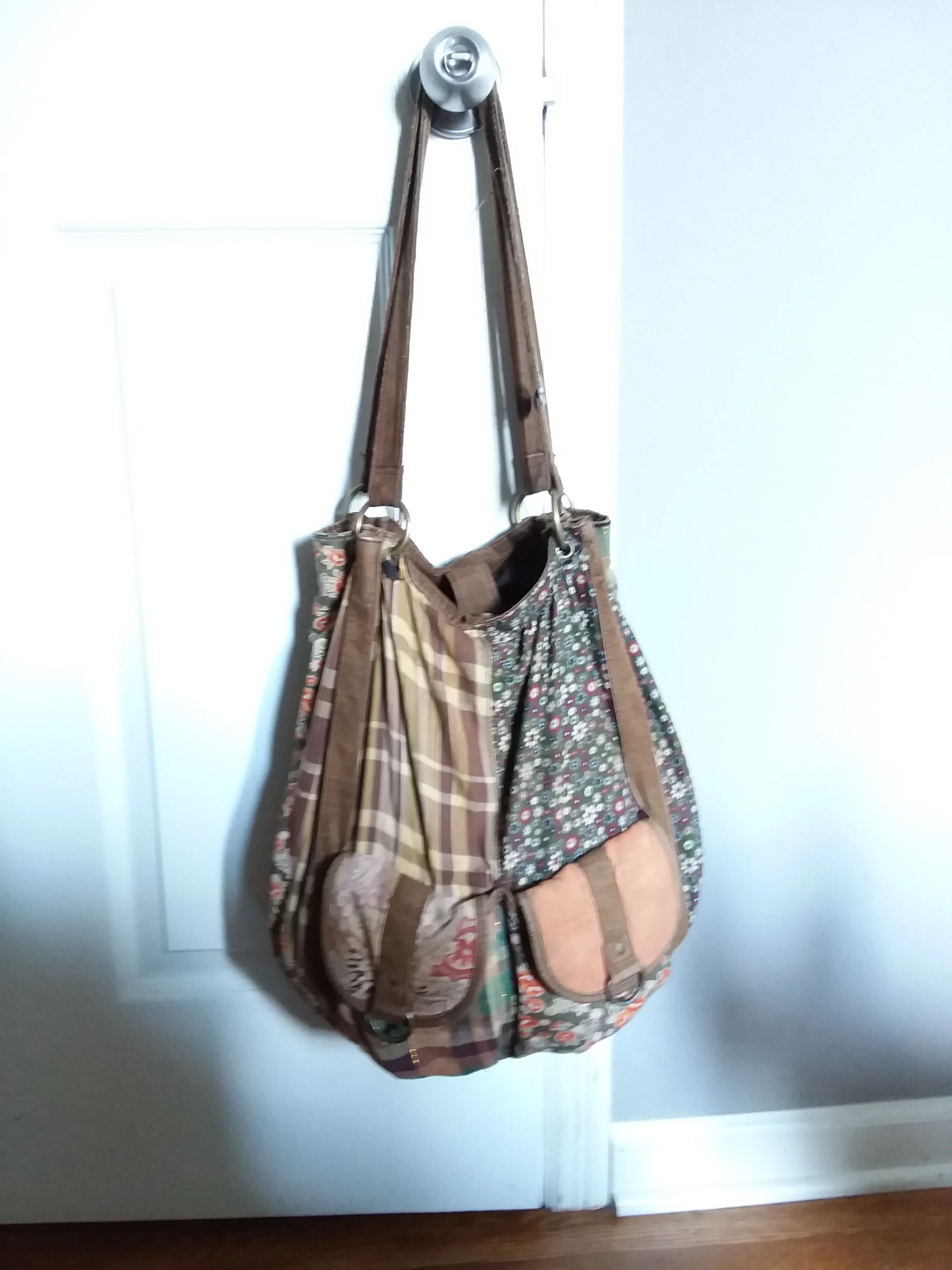 A basic outlet mall purse. I love the way it looks, but it’s getting old and has needed some mending.