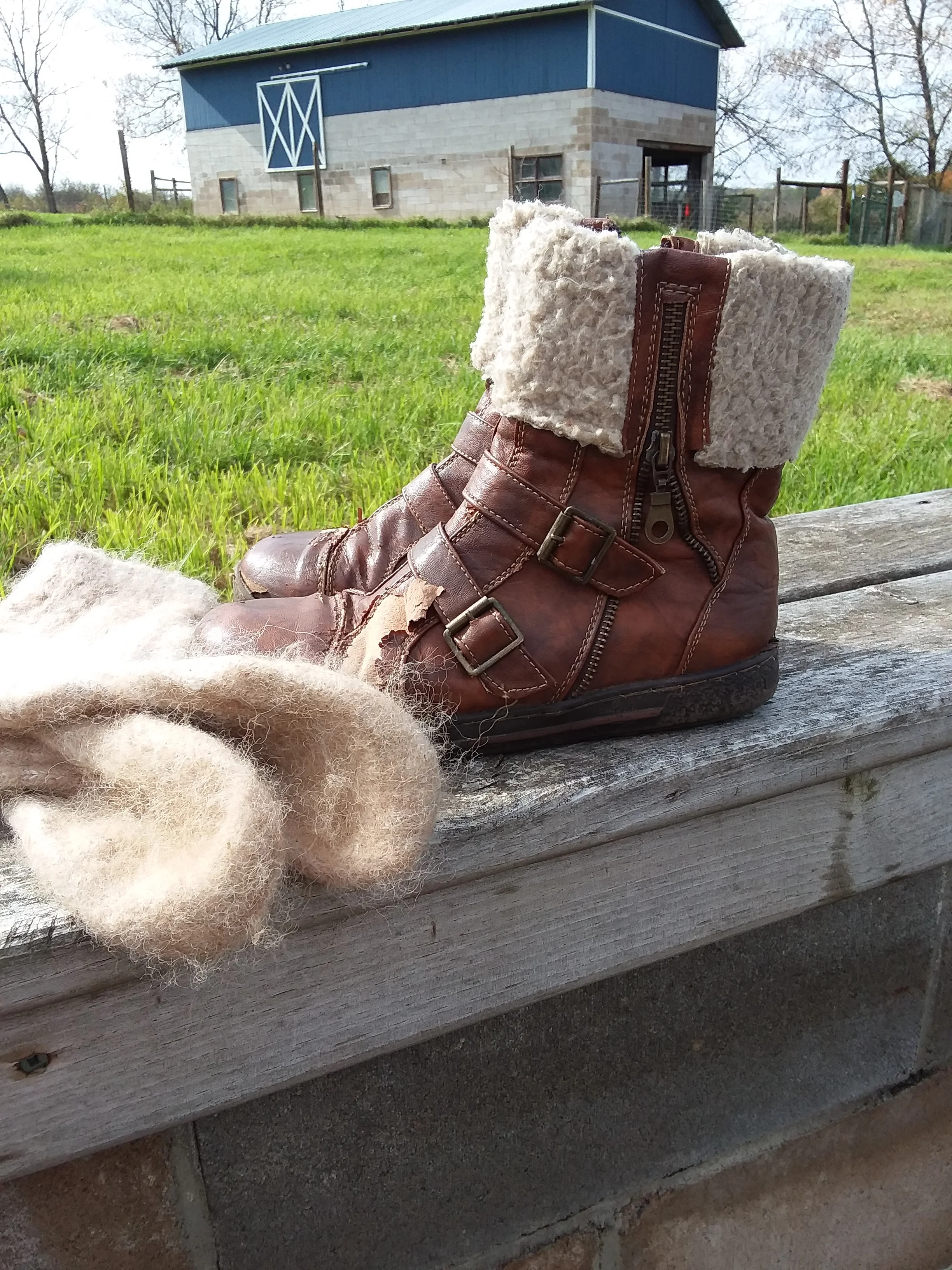 Third-hand boots and handspun alpaca knit socks. You can see these socks are starting to felt on the bottom because I wear them so much.