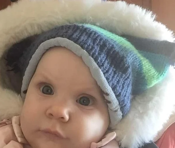 My daughter in the hat.