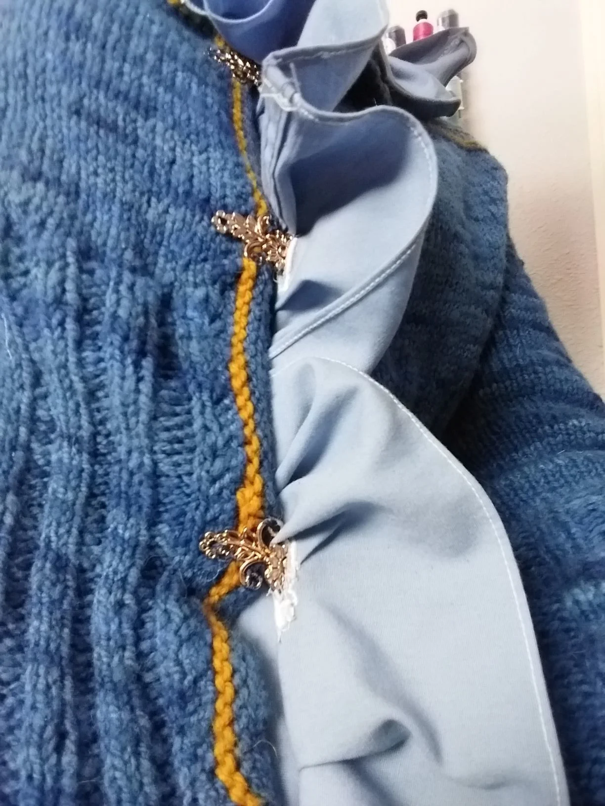 claspsthroughbuttonholes.jpg