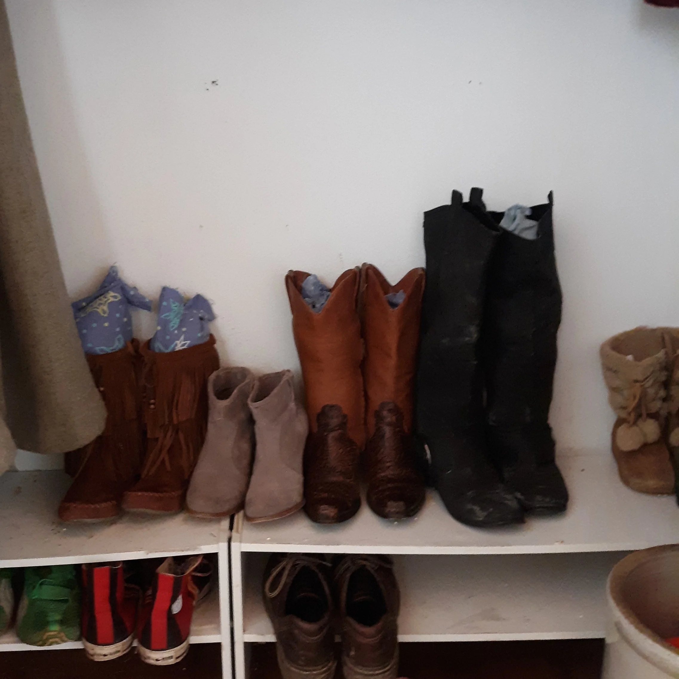 You can see the my old worn-out pajamas peeking out of the top of these boots to help them stand up.