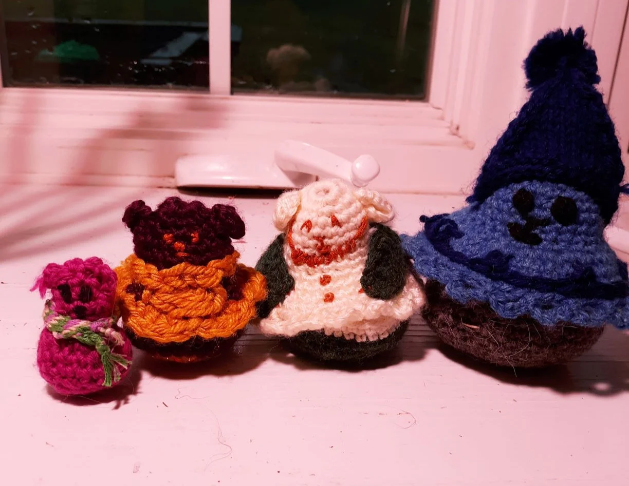 Complete bear family made from store-bought yarn. Baby bear’s scarf is knit from embroidery floss.