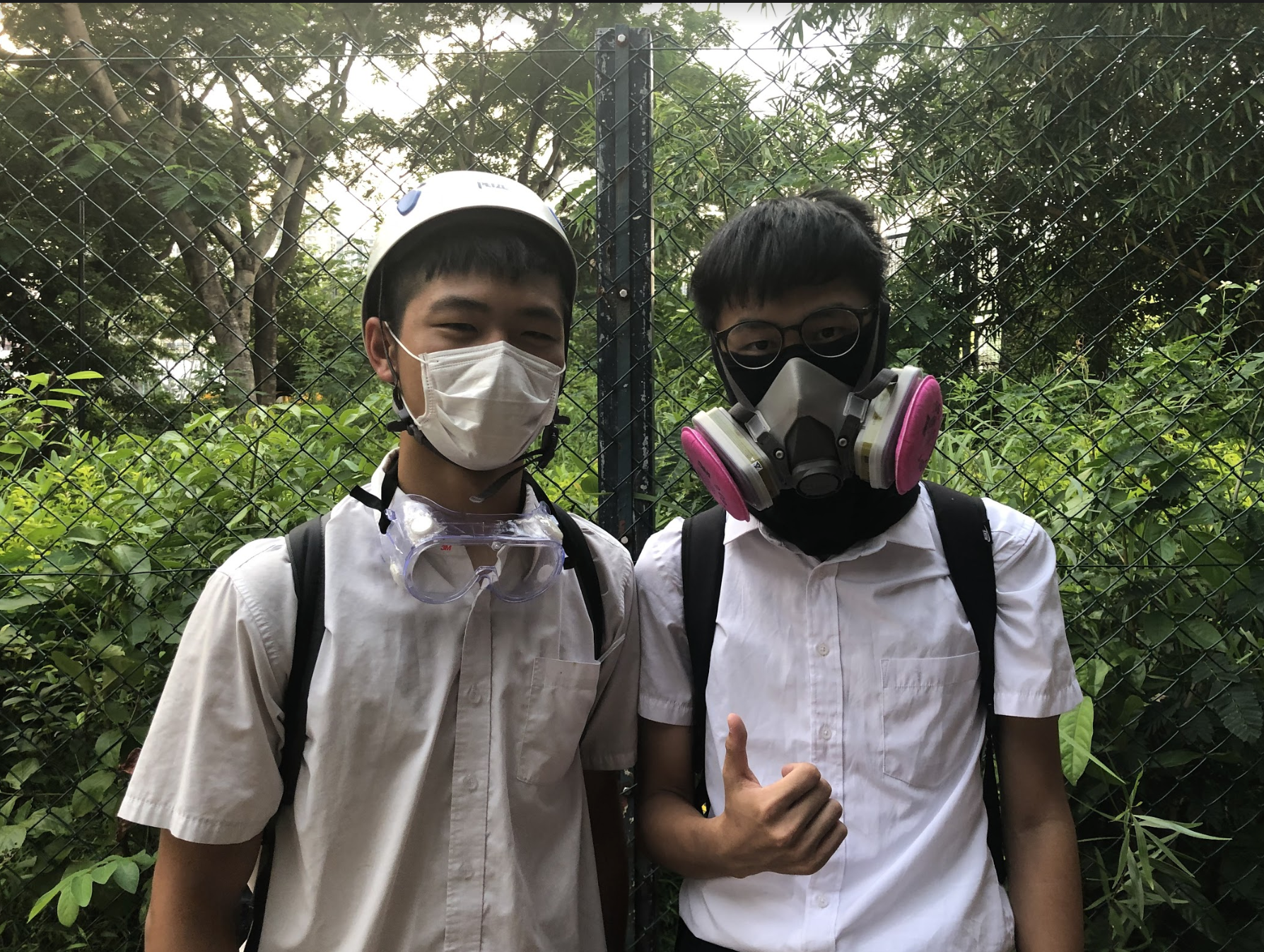 Organizers of this human chain activity: M (left) and K (right). Picture by Kristen Wen.