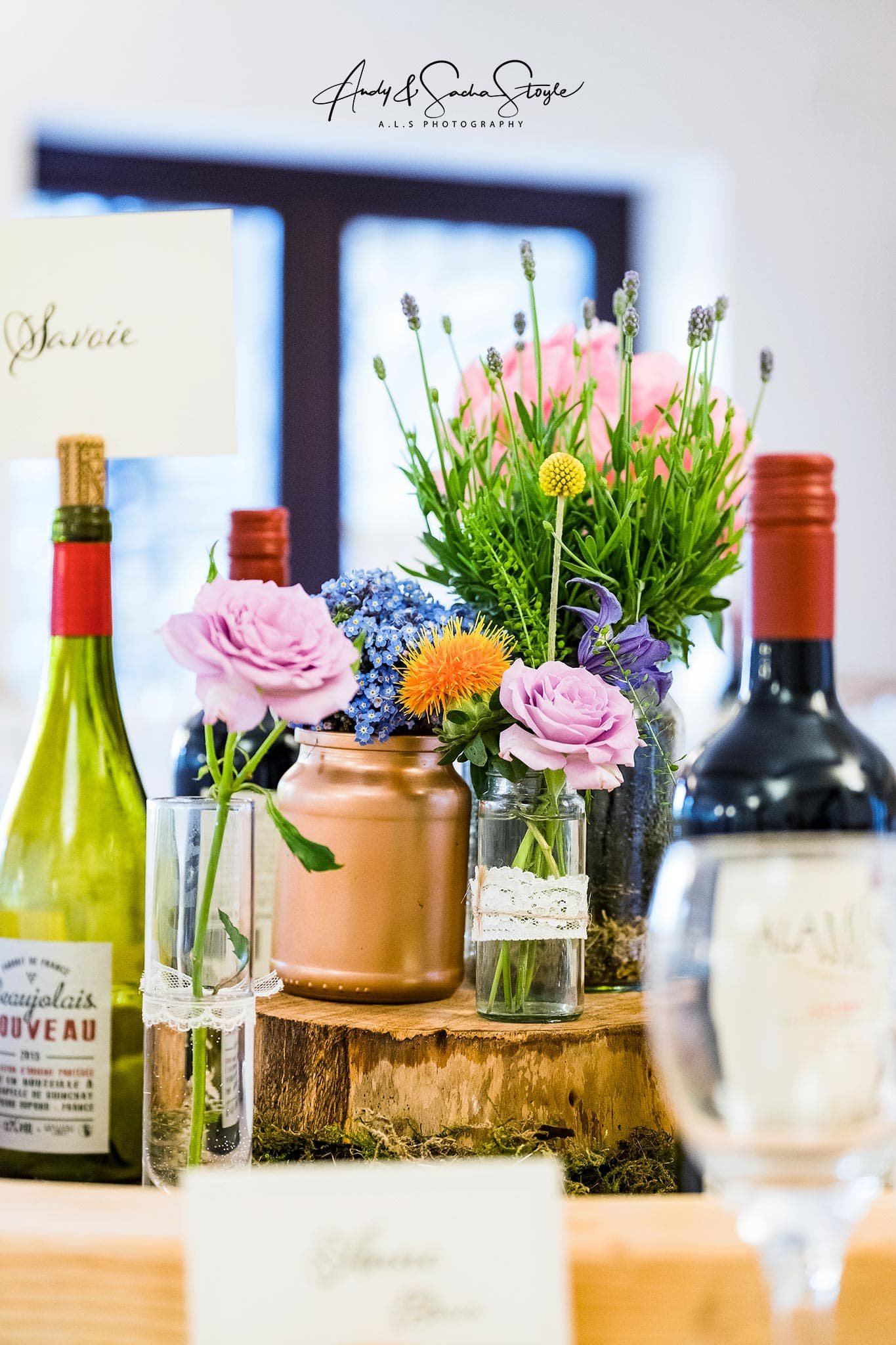 Table centrepiece sat on moss, mix and match arrangements.jpg