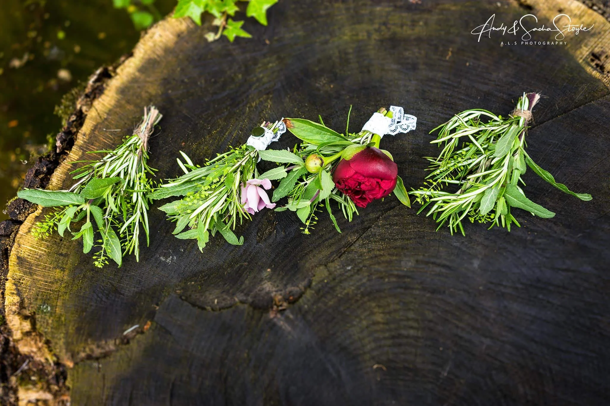 Herb buttonholes for the men.jpg