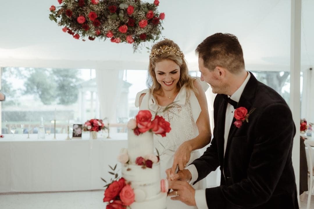 Cutting the cake at Gileston Manor wedding.jpg