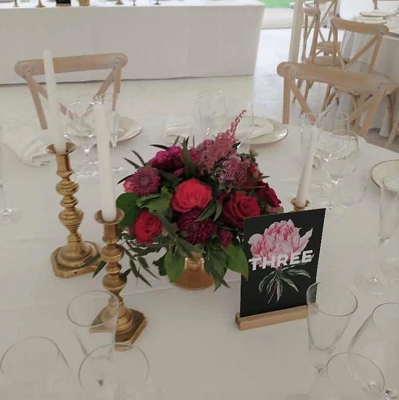 Table centrepiece at Gileston Manor wedding.jpg