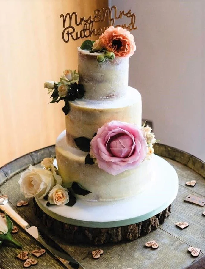 Wedding cake and flowers.jpg