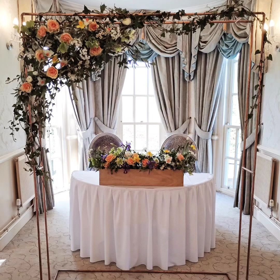 Spring ceremony flowers and no floral foam.

Do you want to learn something? Florists often use floral foam to create these type designs. Foam is plastic which isn't biodegradable and the green dust ends up in our oceans. I haven't used foam in any o