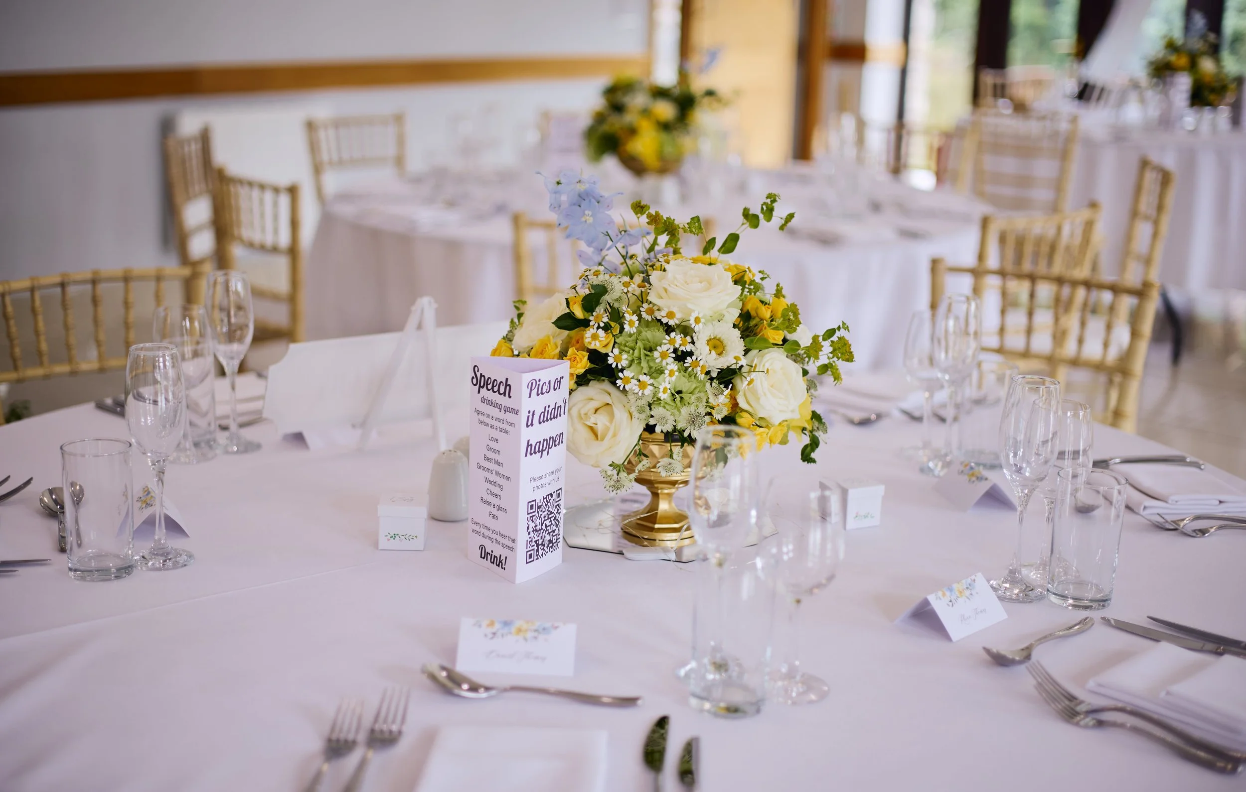 Wedding reception flowers for same sex wedding.jpg
