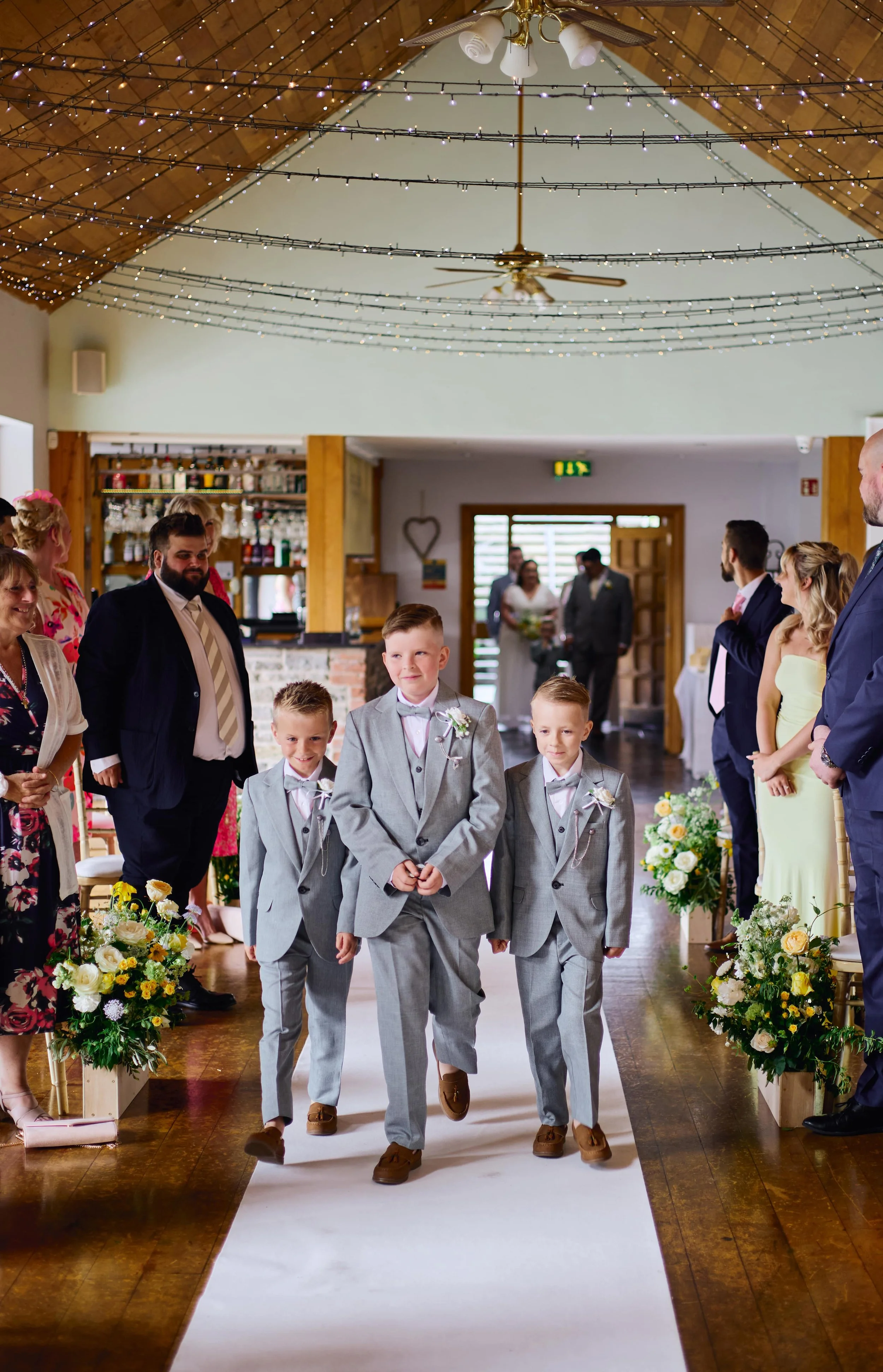 The groom party walking down the aisle LGBTQ+ wedding.jpg